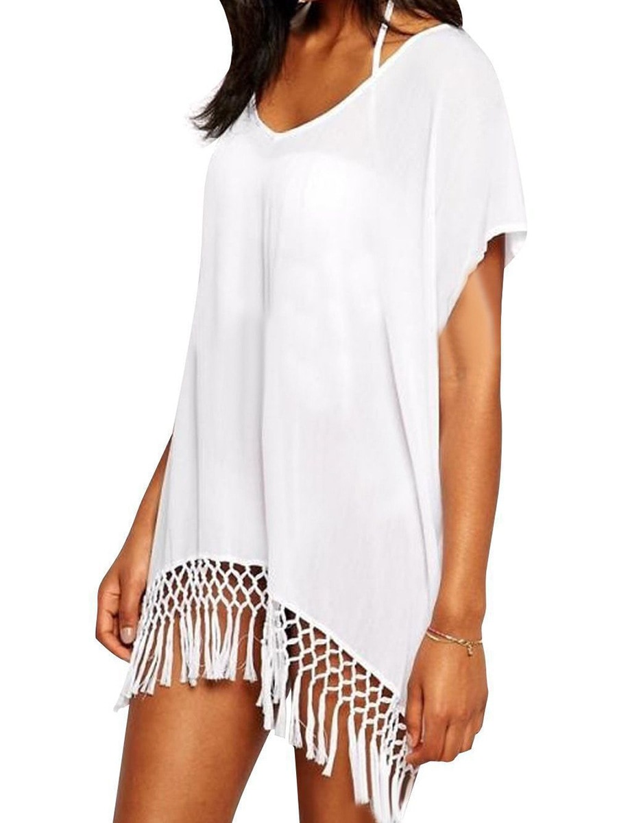 Sexy beach cover-up dress with solid-colored tassel and loose dolman sleeves with sun protection.