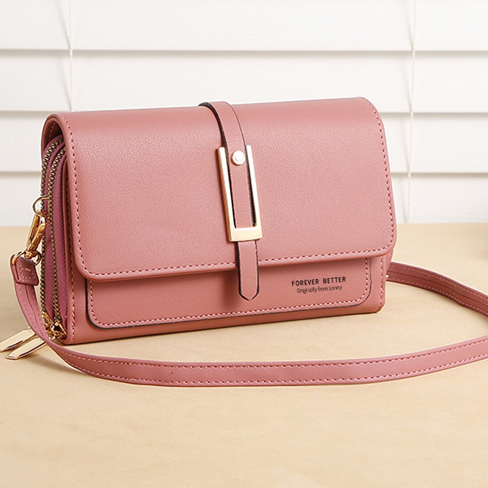 Women's pink faux leather handbag with gold hardware, suitable for everyday and casual use.