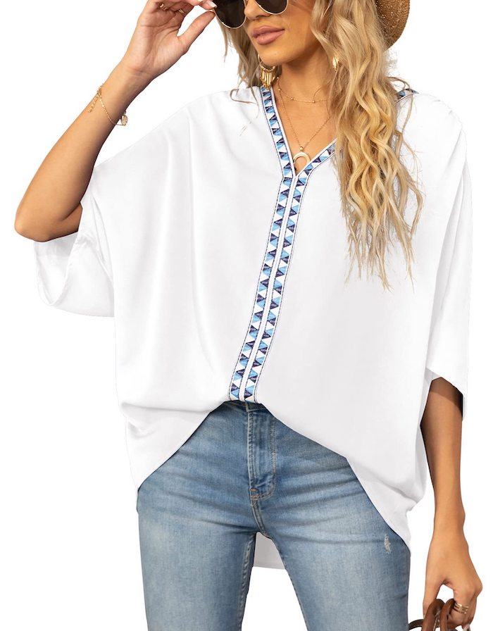 Loose batwing sleeves with a V-neck, casual and elegant solid color lace bottom shirt.