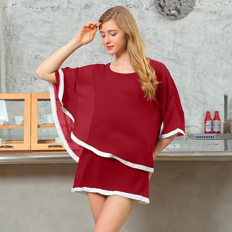 Casual loose-fitting two-piece chiffon top with irregular faux batwing sleeves.