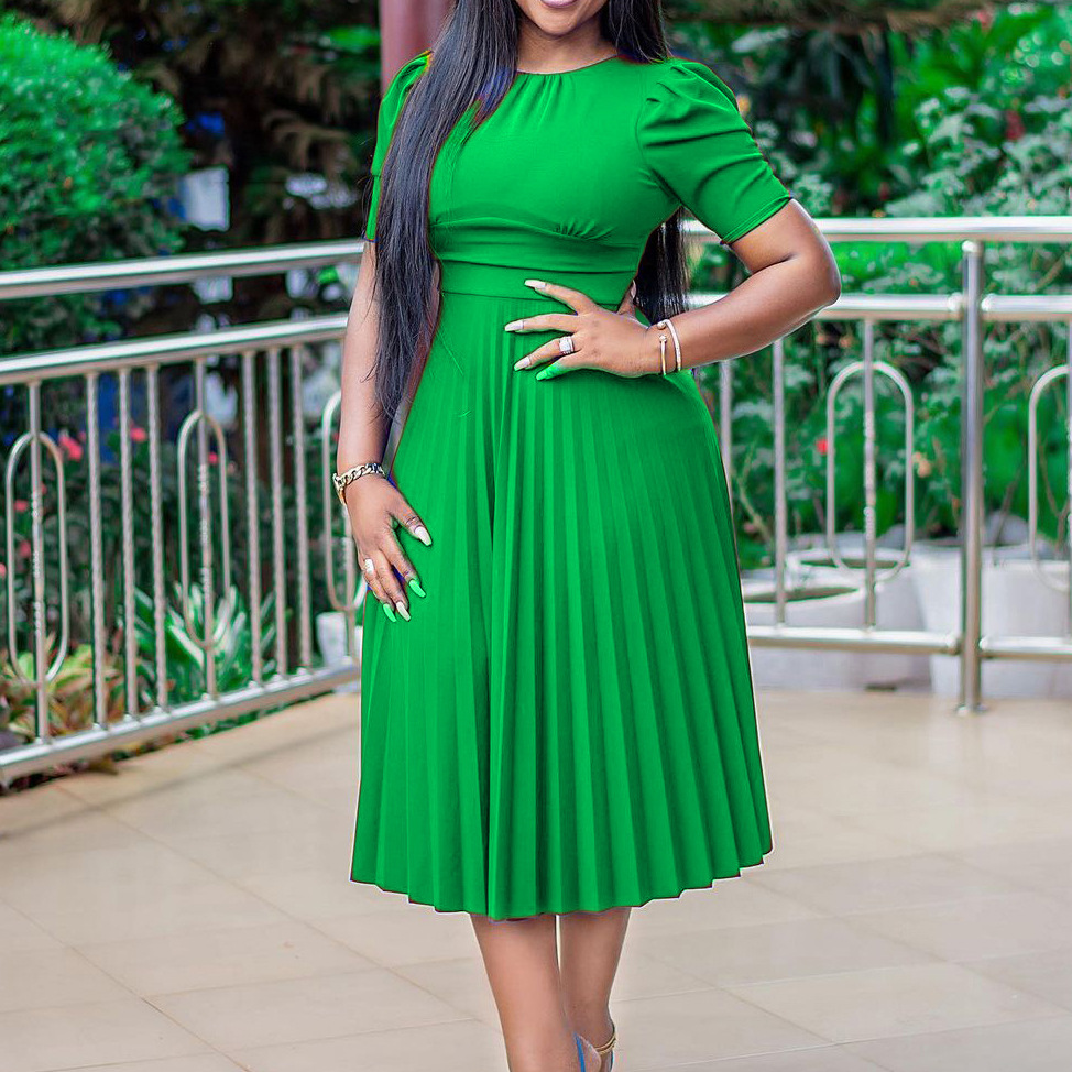 D202 Dress with butterfly sleeves and pleated hem